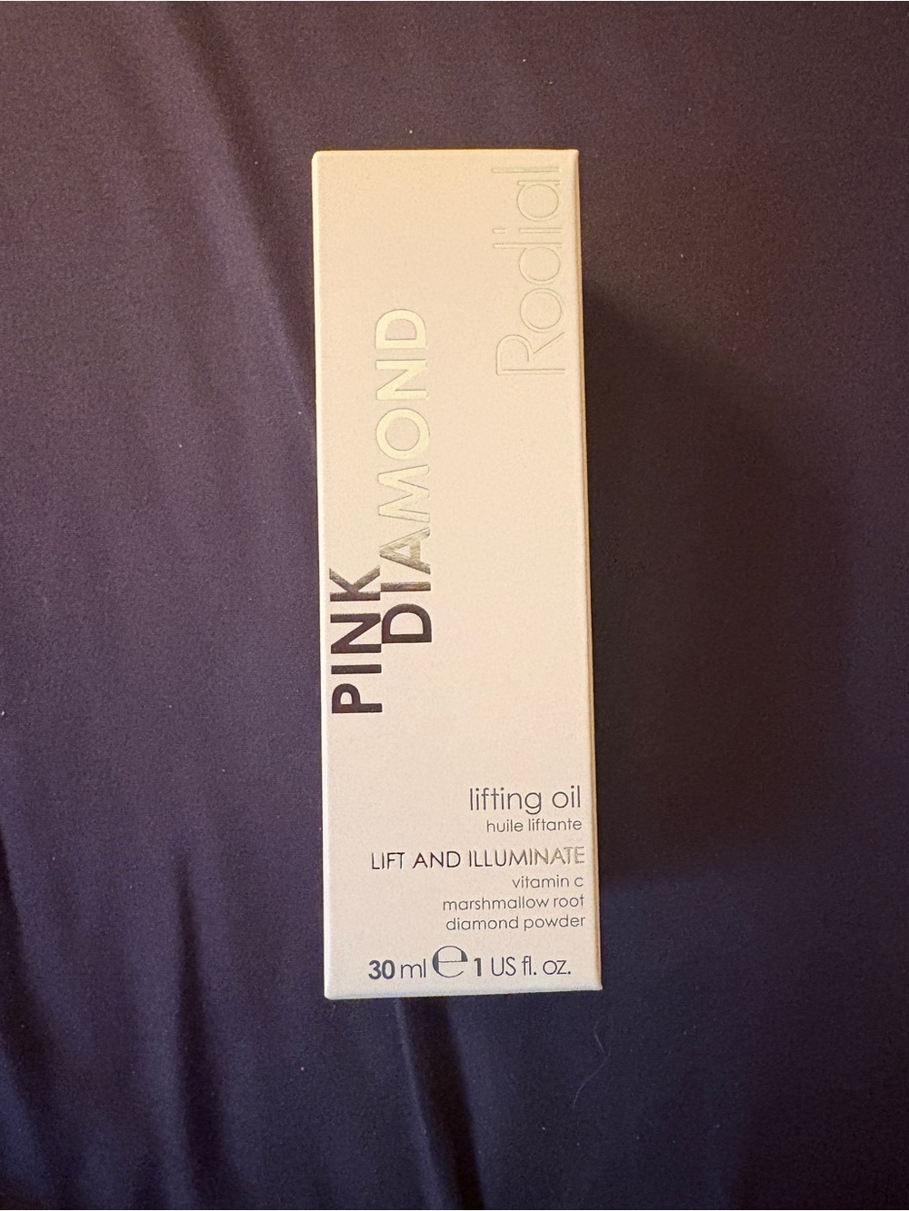 Rodial Pink Diamond Lifting Oil in Pale Pink and Gold Accents